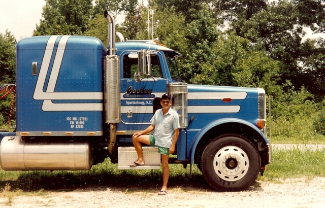 Best looking truck driver I know. Just one of the trucks I drove over 17 years. Photo taken in Spartanburg, SC